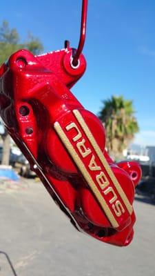 Candy red subaru calipers