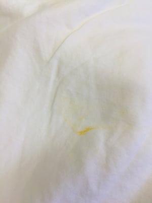 Stains on my bed sheets. I have gotten these laundered with other cleaners before and NEVER had any problems.