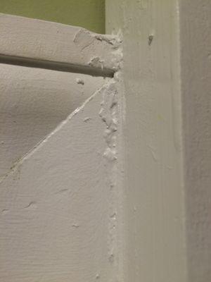 Caulk was not dry or wiped away before being painted.