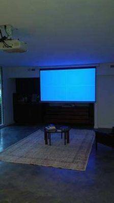 Projector and projector screen installed.