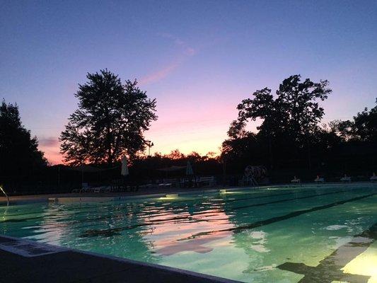 Delhi Swim Club pool at sunset