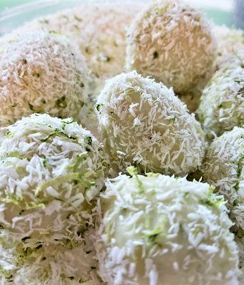 Wasabi Lime: 100% organic. Wasabi, fresh lime zest in white chocolate ganache & coated in shredded coconut & lime zest