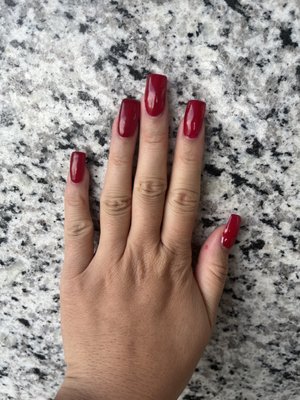 Burgundy colored shovel nails.