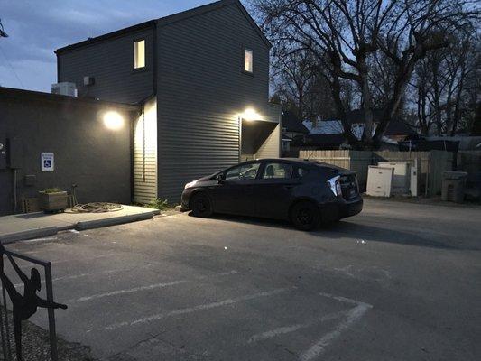 Small parking lot with bike area, 1 handicap space and 2 regular spaces. Off W Resseguie St. alley behind building.