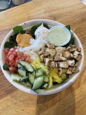 Chicken Rice Bowl with hummus, tzatziki and jalapeno ranch from Pita Fusion