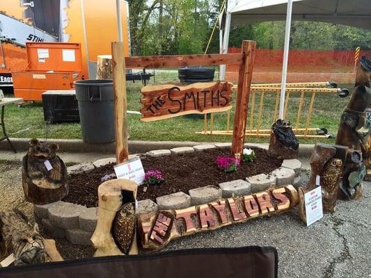 The ever so popular custom carved name logs and post and rail signs.