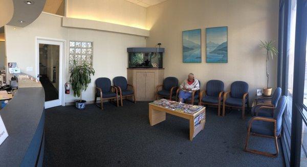 Comfy waiting area. Tons of magazines to read and a cool fish tank to view.