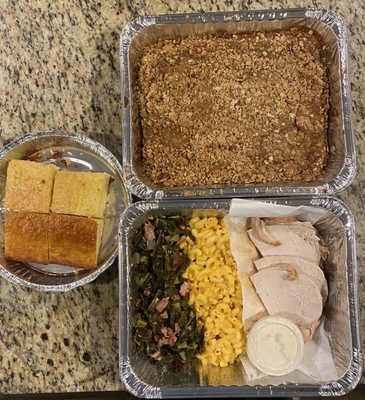 Corn bread, turkey, Alabama white BBQ sauce, collard greens, macaroni and cheese, and Pumpkin pie crumble dessert