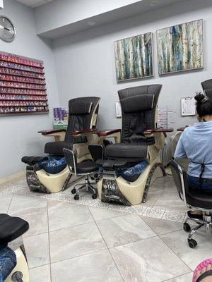 Pedi chairs, nail polish (partial) selection