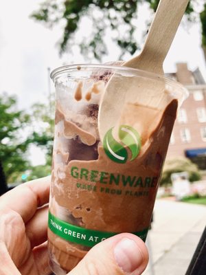 The Bent Spoon -- a flat wooden paddle spoon, chocolate ice cream