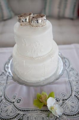 Our wedding cake, which was devoured. Top was coffee, bottom vanilla. Photo makes it seems a little lop-sided, but it wasn't. Shimmery fondt