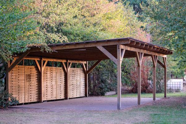 Canopy (Stand Alone) Wood structure with metal roof.