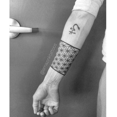 Flower of life arm wrap tattoo by Laura Schrampfer Champeau