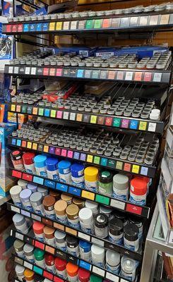 We have a large selection of paints and glues.