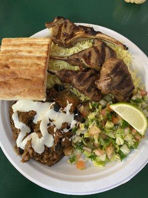 Lamb Rack Kabob plate with a side of eggplant.