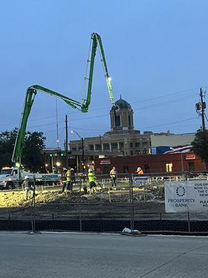 They are up early working on the new bank building!