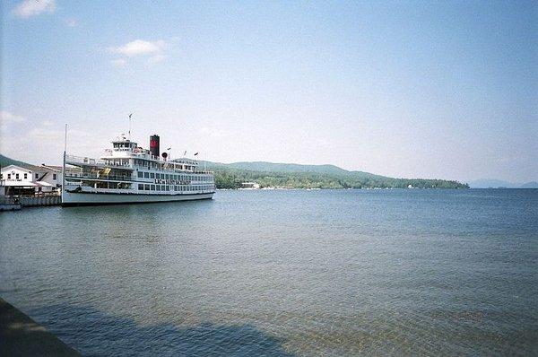 One of the paddle wheel steam boats docked near the beach which will give you a ride along the lake