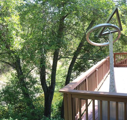 Wind-activated kinetic sculpture on the decks overlooking Sonoma Creek