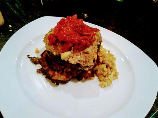 Zucchini layers, cauliflower rice topped with authentic Italian tomato sauce