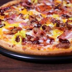 Voodoo Pizza with loaded with premium meats, and drizzles of BBQ and Ranch....very good pizza