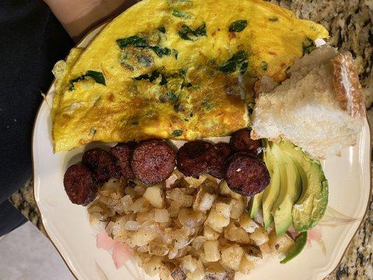 Breakfast plate made with their spicy beef sausage! 10/10