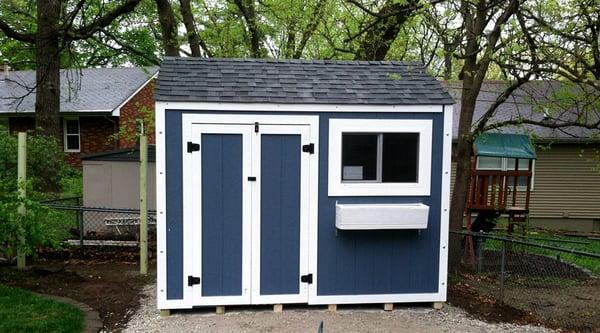 Very pretty backyard Iowa Sheds Garden Shed with Double 5' entry doors and lovely front facing window