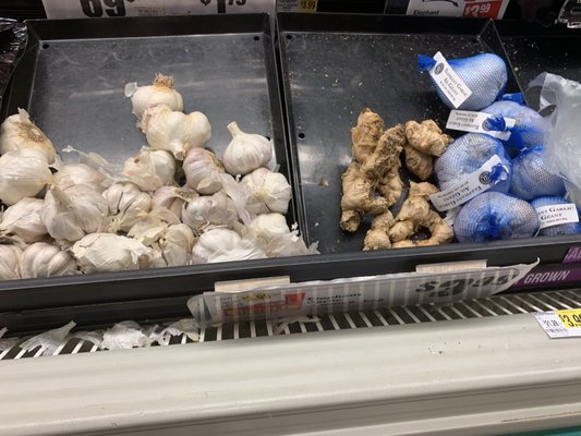 Every 'fresh' garlic bulb was missing cloves and had black mold on the bottom. Ginger was shriveled and rotted.