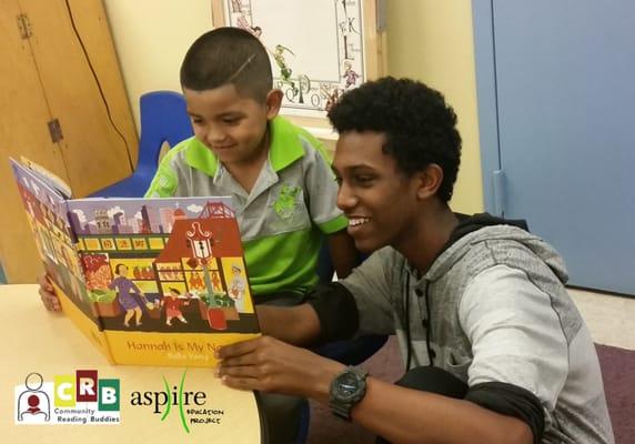 Teens volunteer to read one-on-one with preschoolers.