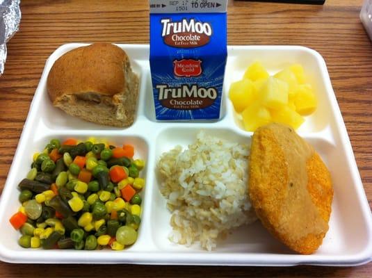 Chicken Patty /w Gravy, Steamed Rice, Mixed Vegetables, Pineapple Chunks, Whole Wheat Roll & Milk.