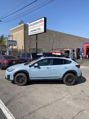 Installed new springs to raise the clearance on this Subaru Crosstrek.