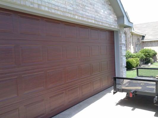 This is a metal door that looks like wood - beautiful, affordable, and easy to maintain