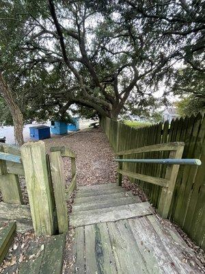 Staircase down from the park to a little picnic table...