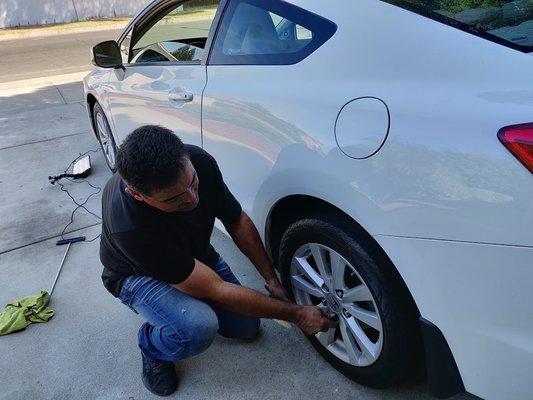 He even removed the wheel to get to the right tight spot for a gas tank area ding. Looks great!