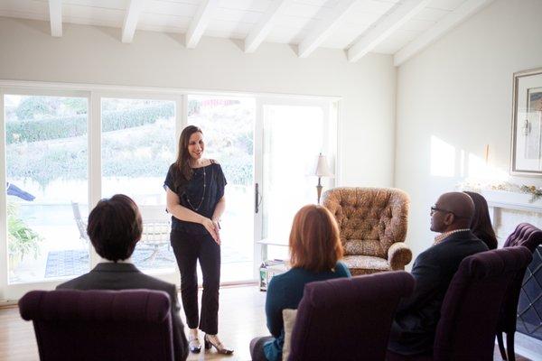 Elysia teaching intuitive listening to realtors.