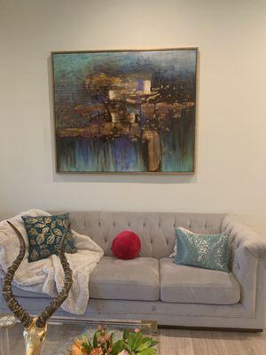 Large painting hung in home living room