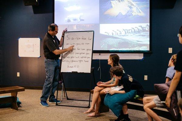 A volunteer leads an FSM (Fellowship Student Ministries) lesson