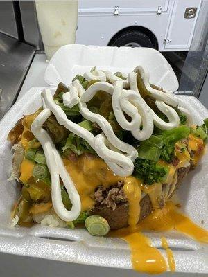 Cheese, steak, broccoli, and sour cream