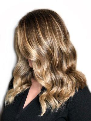 Balayage and angled mid length cut