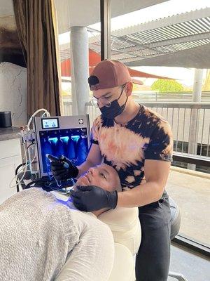 Client receiving a HydraFacial MD treatment.