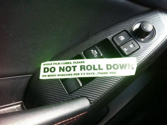 Nice sticker to help remind you not to roll it down for 5 days!