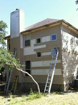 Siding repair and painting.