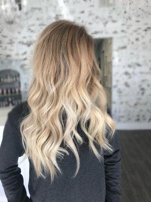 Blonde balayage with root smudge