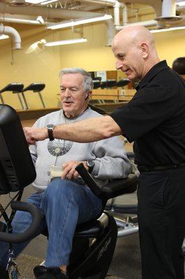 Our on-site R.N., Steve Bonwit, shows a member the importance of monitoring your heart rate.