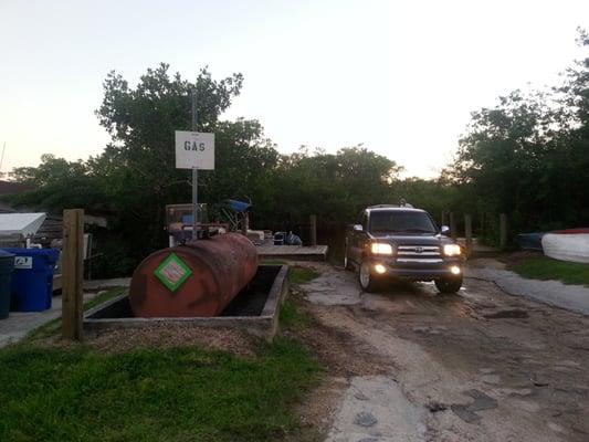 Boat ramp adjacent to an above ground gas tank