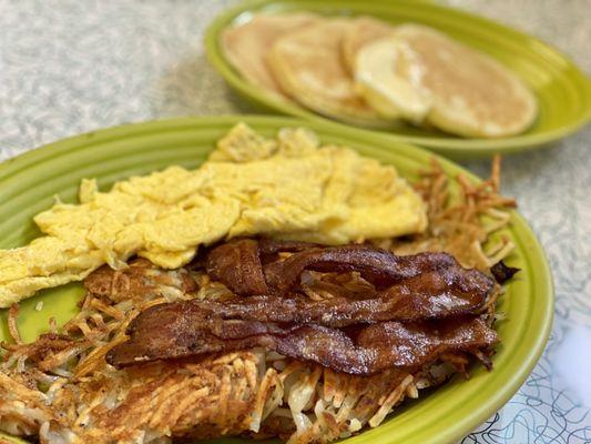 Get 'er Done-Scrambled Eggs (well done), 4 strips of bacon , hash browns (fills 3/4 of the plate) & 4 silver dollar pancakes