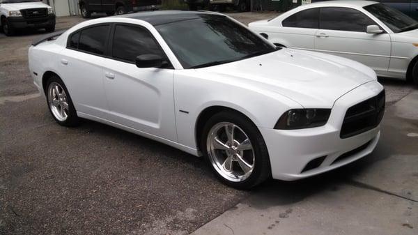 Painted roof carbon gloss black ,smoked out headlamps and tail lights,semi gloss black mirrors and spoiler  