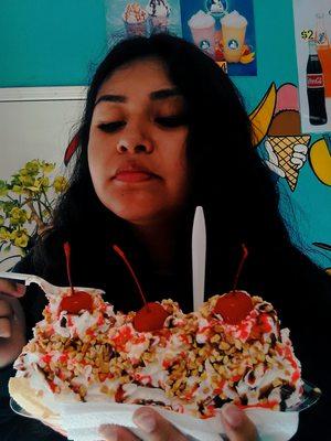 My cousin eating a sundae or banana split. Whatever it was she loved it.