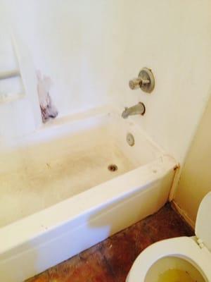 Old and dirt, fiberglass tub shower, we're going to bring back and looks nice and bright white