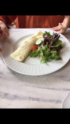 all white omelet and light side salad ( customized by a club member to reduce her high cholesterol )