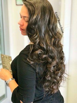 Color,haircut and styling with big soft waves